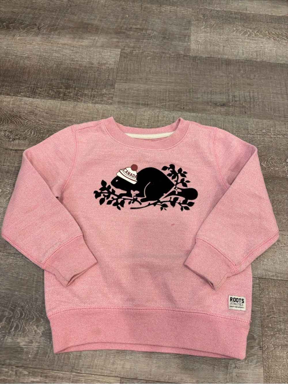 Roots Pink Crewneck Sweatshirt with Black Beaver Graphic